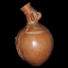 Hominoid orange ware terracotta vessel